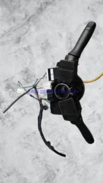 Close-up view of the headlight and turn signal indicator stalk on genuine Corolla XLI switch panel on Partex